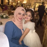 A mother and her daughter at a wedding